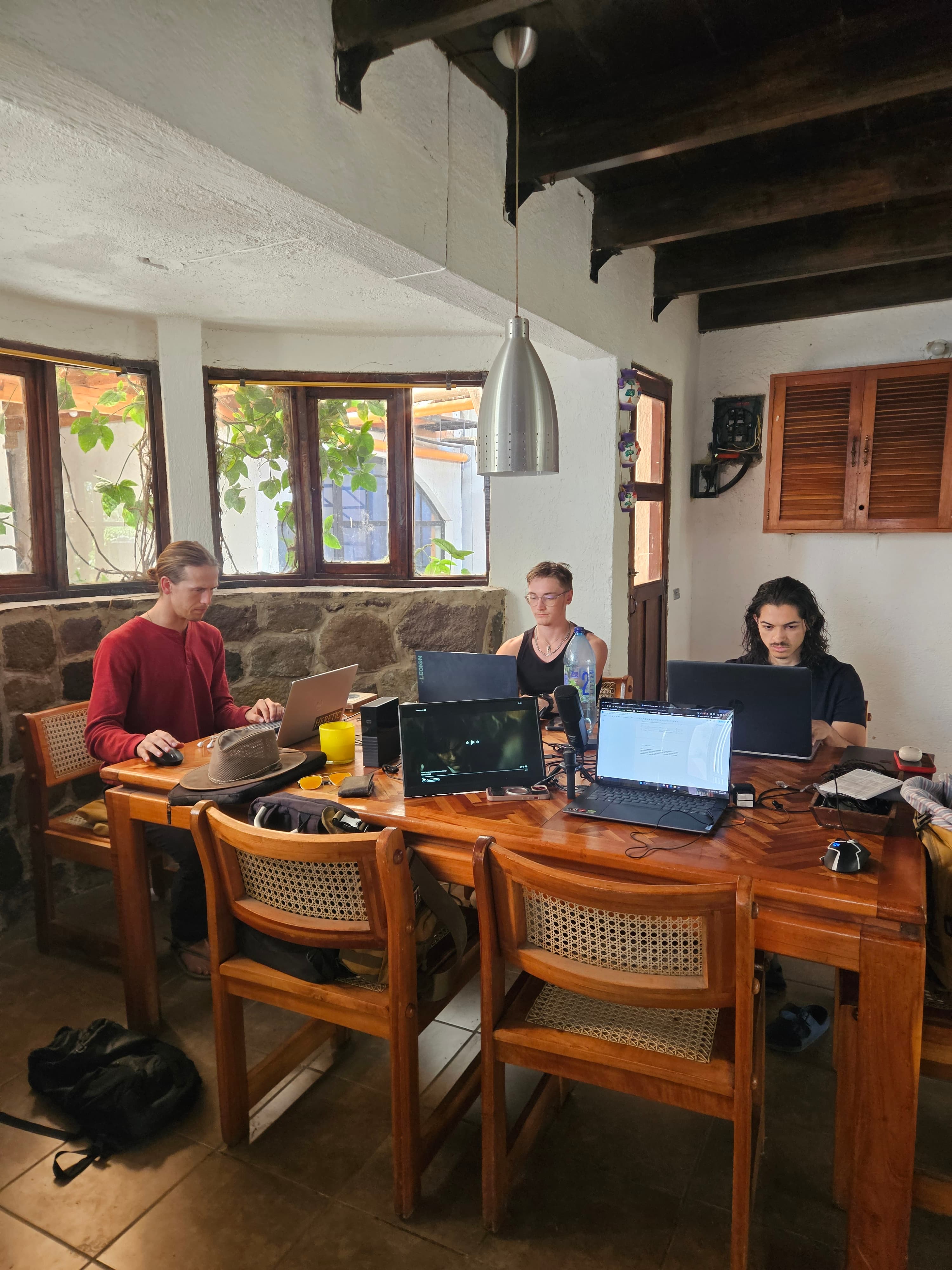 Builders planning together around a table