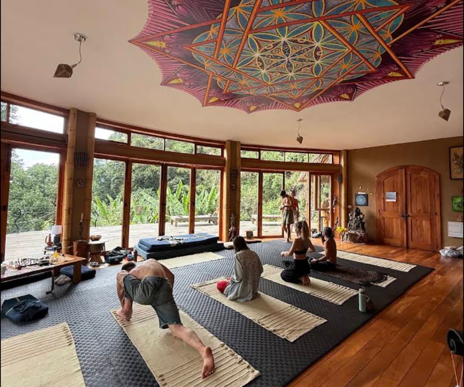 The movement hall, mandala ceiling and doors open to the valley